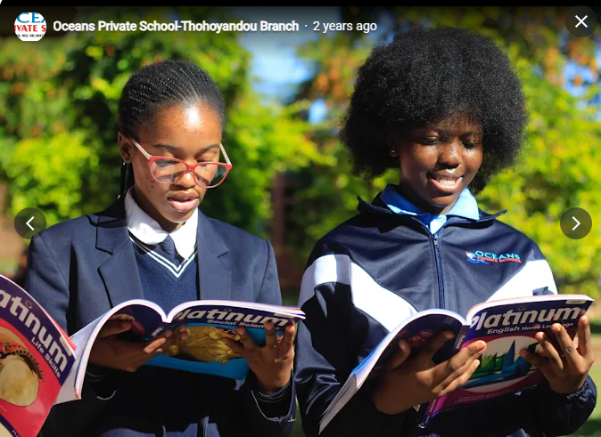 Senior girls reading study books